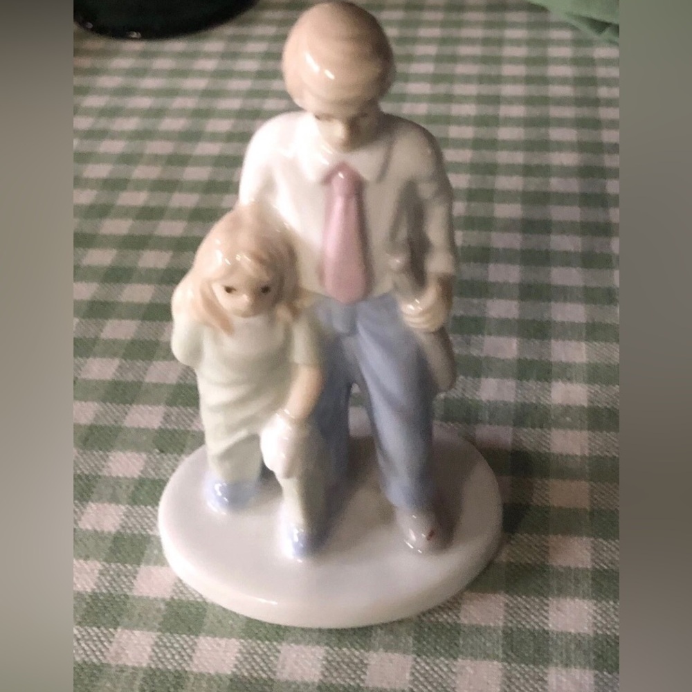Porcelain Man and Child Figurine “Ball Theme”